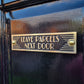 Art Deco 'Leave Parcels Next Door' Door Sign - The Metal Foundry