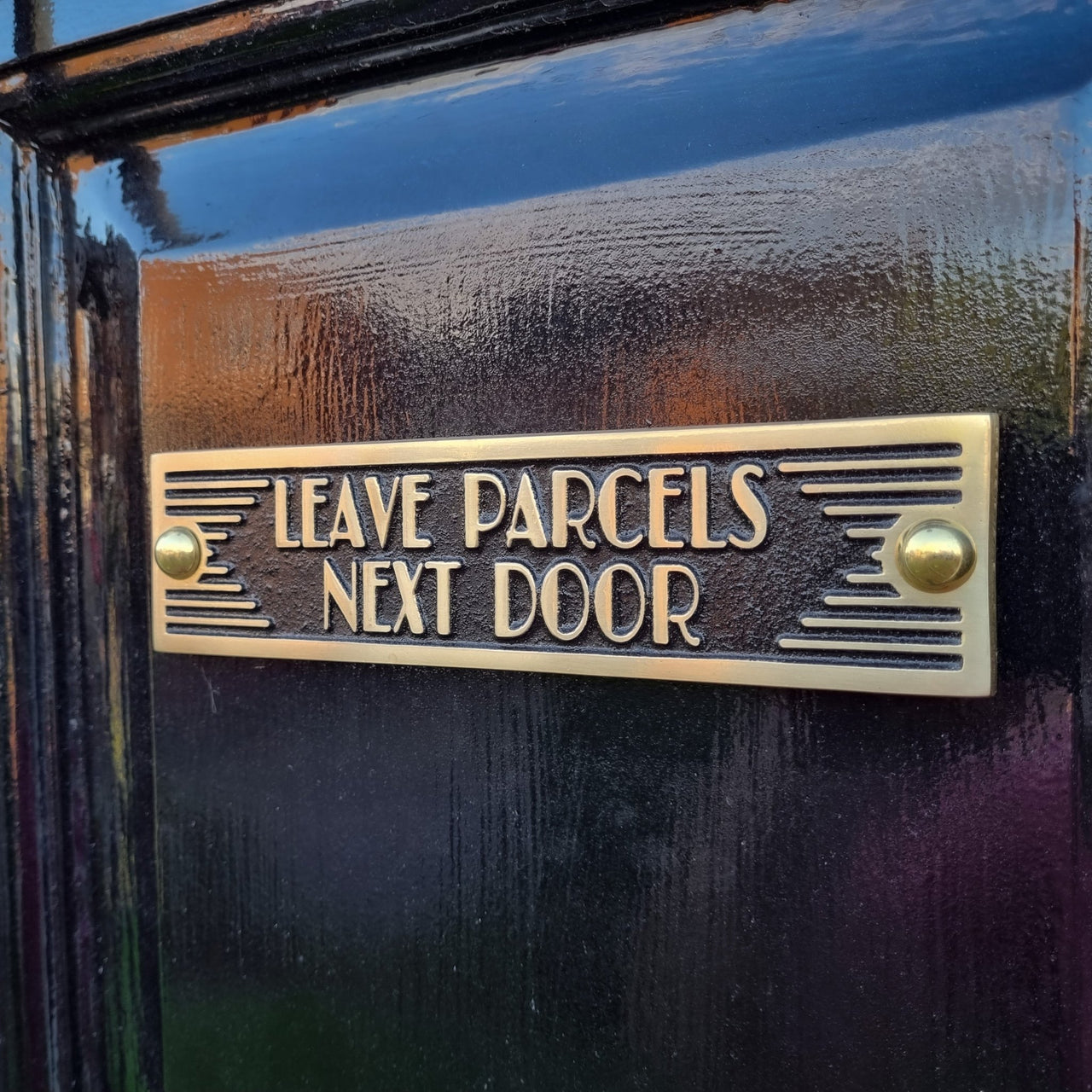Art Deco 'Leave Parcels Next Door' Door Sign - The Metal Foundry
