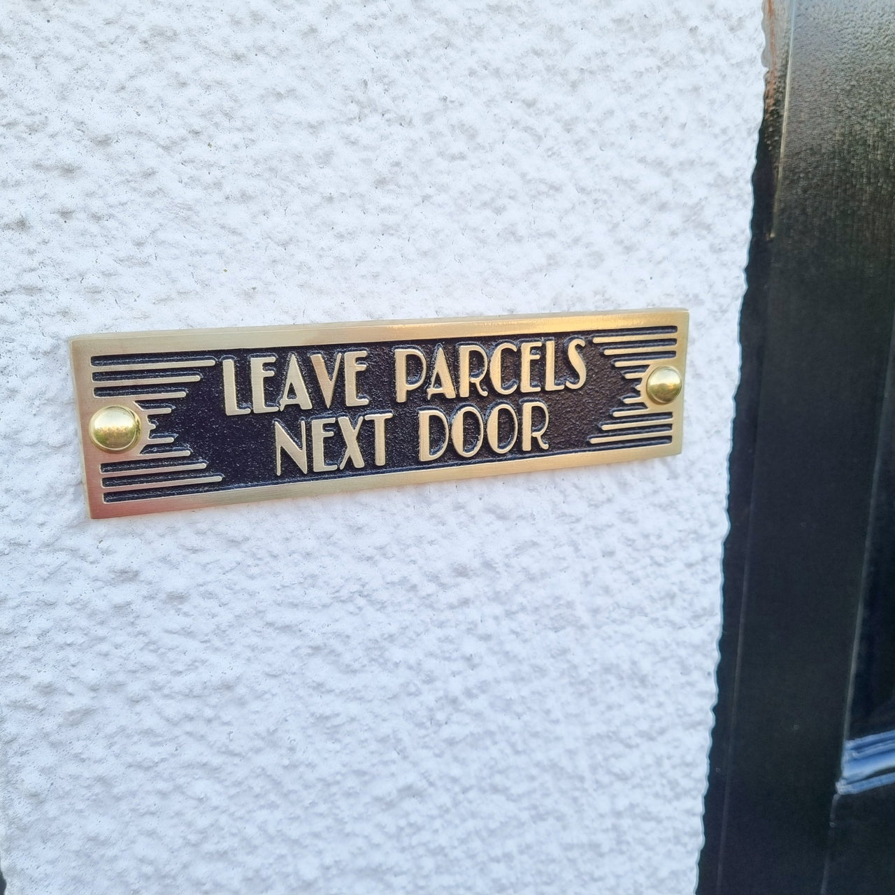 Art Deco 'Leave Parcels Next Door' Door Sign - The Metal Foundry
