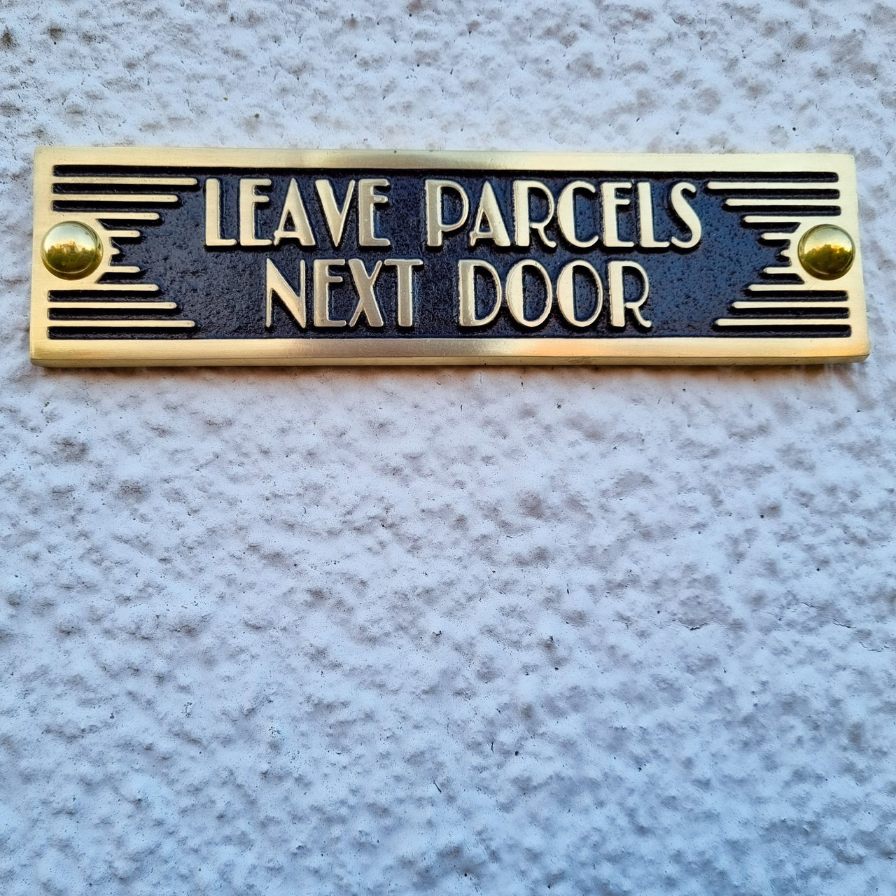 Art Deco 'Leave Parcels Next Door' Door Sign - The Metal Foundry