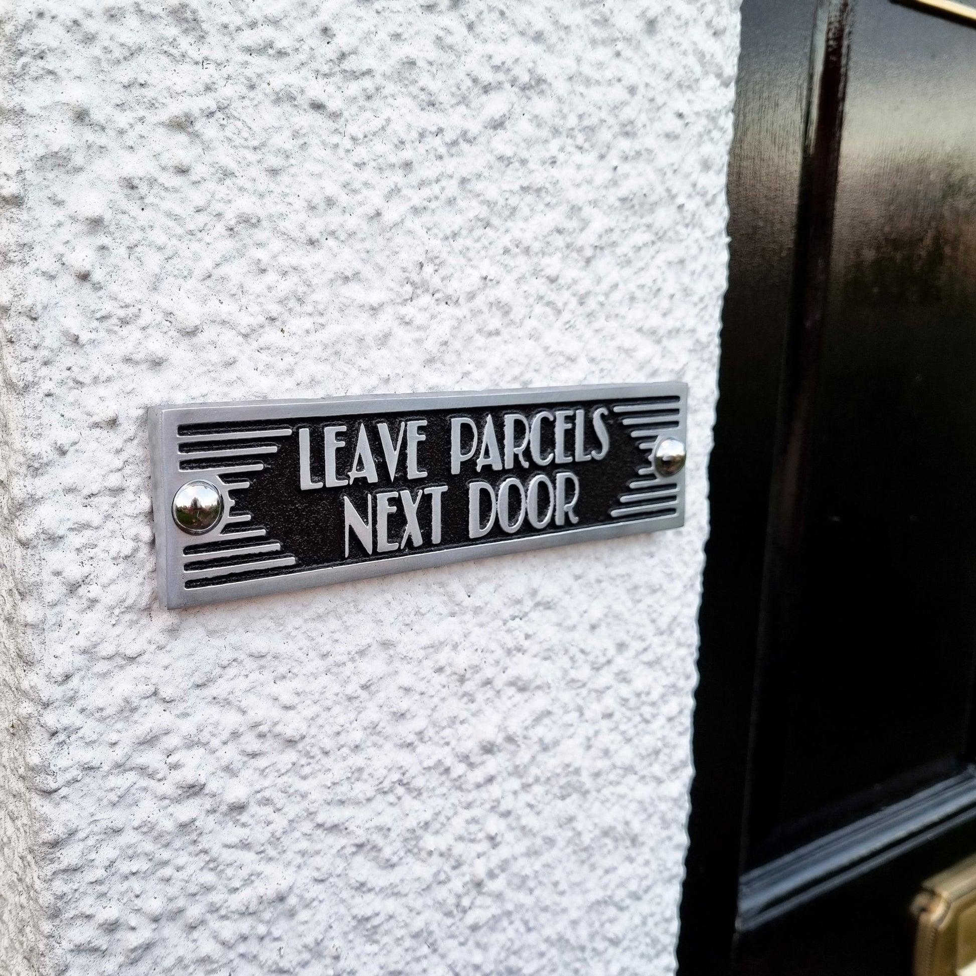 Art Deco 'Leave Parcels Next Door' Door Sign - The Metal Foundry